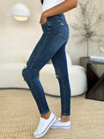 Load image into Gallery viewer, Women Full Size Mid Waist Distressed Slim Jeans